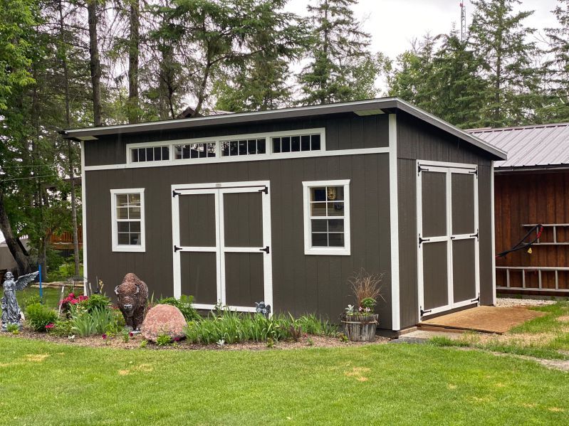 12x16 Urban Shed Castlemore Siding. cover photo 12x20 Urban Style Smokehous Gray Siding White Trim